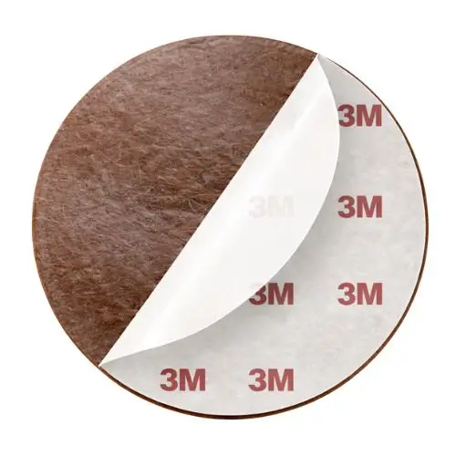Rear view of a leather patch showing the branded 3M peel-and-stick adhesive backing layer.