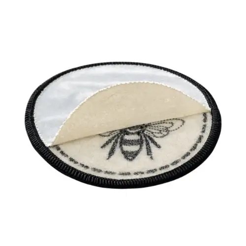 Self adhesive backing for patches