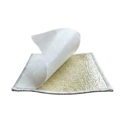 A custom patch showing the white wax paper being peeled back to reveal a sticky temporary adhesive backing.