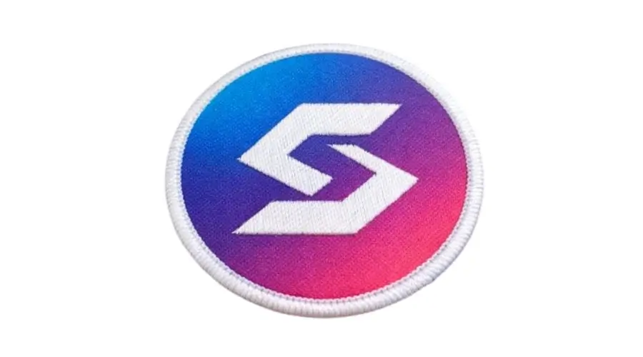 Custom logo patch showing smooth blue-to-pink gradient color fade using dye sublimation.