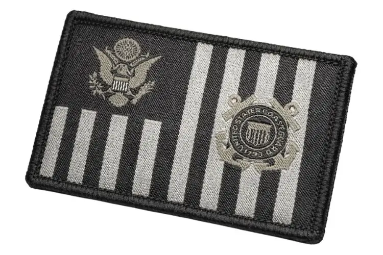 Subdued black and grey tactical U.S. Coast Guard ensign patch for specialized units.