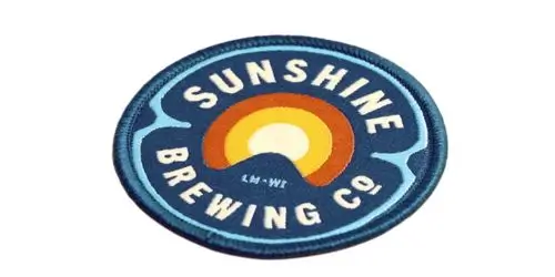 Round woven patch featuring a smooth multi-color sunset gradient for Sunshine Brewing Co.